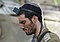 IDF soldier kippah put on tefillin-small.jpg