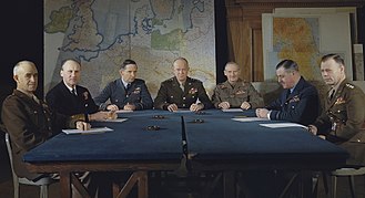 Senior Allied commanders in February 1944. Left to right: Lieutenant General Omar Bradley; Admiral Sir Bertram Ramsay; Air Chief Marshal Sir Arthur Tedder; General Dwight D. Eisenhower; General Sir Bernard Montgomery, Commander in Chief 21st Army Group; Air Chief Marshal Sir Trafford Leigh-Mallory; and Lieutenant General Walter Bedell Smith Meeting of the Supreme Command.jpg