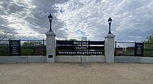 A sign on Central Avenue NE and Broadway Street NE welcomes visitors and lists the neighborhoods of Northeast Northeast MPLS Neighborhoods sign.jpg