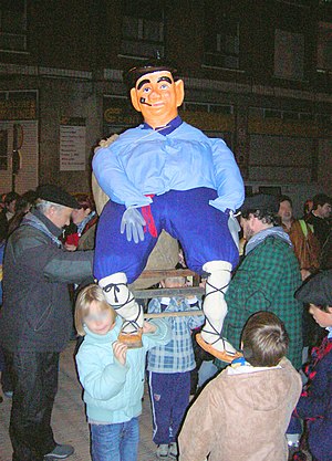 A figure of Olentzero being carried through the streets of Bagatza, Barakaldo