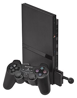 Konsol PlayStation 2 Slimline dengan pengontrol DualShock 2