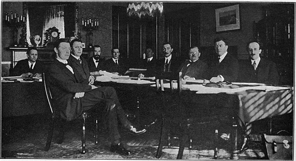 From left to right—R. J. P. Mortishead (Secretary), John O Byrne B.L., C. J. France, Darrell Figgis}} (Acting Chairman), E. M. Stephens B.L. (Secretary), P. A. O'Toole B.L. (Secretary), James MacNeill, Hugh Kennedy K.C., James Murnaghan B.L., James Douglas Prof. Alfred O'Rahilly, and Kevin O'Shiel B.L. were absent from the Session)
