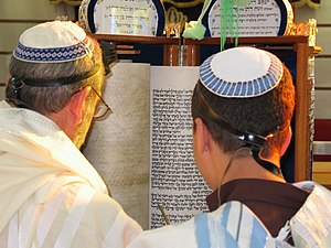 Boy reading from the Torah according to Sephar...