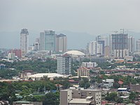 The hotel (2nd building from the right), with surrounding buildings (2015)