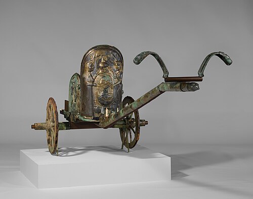 The Monteleone chariot is an Etruscan chariot, dated to circa 530 BC, that was uncovered in 1902 at Monteleone di Spoleto in Umbria, Italy, in an underground tomb covered by a mound. It was part of a chariot burial, containing the remains of two human corpses along with two drinking cups. Measuring 131 centimetres (51+5⁄8 inches) in height and designed to be drawn by two horses, the chariot itself is constructed of wood covered with hammered bronze plates and carved ivory decoration. The Monteleone chariot is now in the collection of the Metropolitan Museum of Art in New York City.