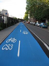 Cycle Superhighway 3 passes to the north of Canary Wharf and links the estate to the City of London, Westminster and Hyde Park on a predominantly traffic-free route. Cable Street cycle superhighway.jpg