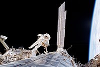 Robert Curbeam on an EVA to install the Destiny science module onto the ISS during STS-98 Curbeam works on the Destiny module.jpg