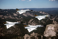 Convair F-106A Delta Dart of ADC's 5th Fighter-Interceptor Squadron near Mount Rushmore (lower right background) F-106s 5th FIS over Mt Rushmore 1981.JPEG