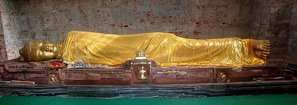 Reclining statue of Buddha at Parinirvana Stupa.