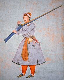 Mughal matchlock rifle, 16th century. Officer of the Mughal Army, c.1585 (colour litho).jpg
