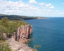 Palisade Head on Lake Superior was formed from a Precambrian rhyolitic lava flow. Palisade, Shovel Point (cropped).jpg