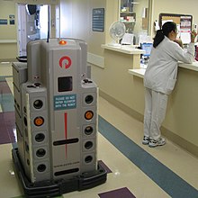 In the 21st century, robots are beginning to perform roles not just in manufacturing but also in the service sector - in healthcare, for example. Pyxis Pharmacy Robot by Nurse Station.JPG