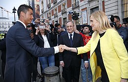 Ronaldo with Cristina Cifuentes, President of the Community of Madrid, during the 2016 Champions League title celebrations in Madrid Real Madrid, campeon de la Champions (27309388231).jpg