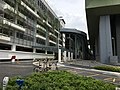 Approach to entrance B of the station, with the multi-storey park and ride building at left.