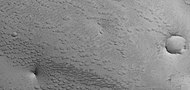 Field of small pits, as seen by HiRISE under HiWish program
