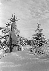 A Finnish soldier on guard near Kemijarvi in February 1940. A Finnish guard during the Battle of Salla.jpg