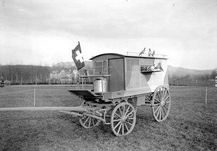 A mobile station wagon occupied by homing pigeons