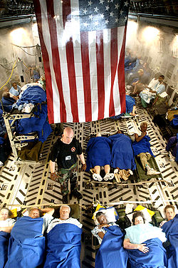 Sick and injured people being evacuated aboard a C-17 Globemaster III Hurricane Katrina Medical Evacuees.jpg