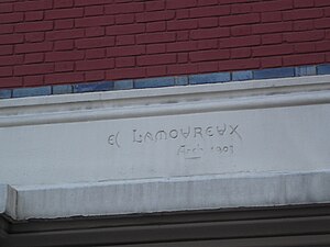 Signature d'Edmond Lamoureux sur l'immeuble du 41, rue Chaptal.