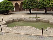 The fountain basin in the Patio de Machuca