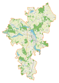 Mapa konturowa gminy Olecko, u góry po prawej znajduje się punkt z opisem „Plewki”