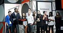 Coogler accepts the U.S. Grand Jury Prize: Dramatic with the crew of Fruitvale Station at the 2013 Sundance Film Festival. Ryan Coogler at Sundance 2013, 3.jpg