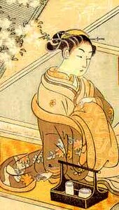 An oiran preparing herself for a client, ukiyo-e print by Suzuki Haronubu (1765) Suzuki Haronubu oiran ukiyo-e.jpg