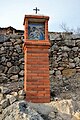 Estación XI del Viacrucis de Casasbajas (Valencia): Jesús es clavado en la cruz.