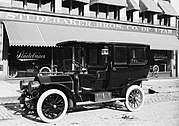 1908 Studebaker Brothers limousine. This limousine had an open driver's compartment for the chauffeur and a closed cabin for the passengers, which was typical in Edwardian limousines.