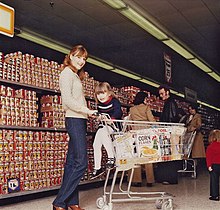 In a family unit, an adult female often makes brand choices on behalf of the entire household, while children can be important influencers. 1970sgrocerystore.jpg
