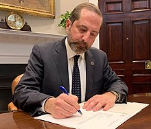 Health and Human Services (HHS) Secretary Alex Azar signs a public health emergency declaration. Alex Azar declares PHED for Coronavirus.jpg