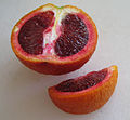 A blood orange cut open