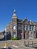 Herenhuis, onderdeel van een complex van vijf woonhuizen in neorenaissancestijl met op onderdelen neogotische details.