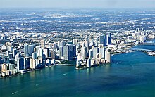 Miami is the 11th-largest city in the region, and part of the region's second-largest metropolitan area. Downtown Miami (8204604490).jpg