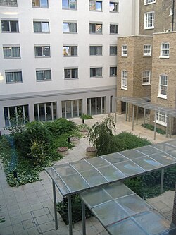 The second of the two courtyards created by the construction of the Central Wing. This one is overlooked by the Central Wing and the Lansdowne Terrace Flats. IH Lansdowne terrace Courtyard.JPG