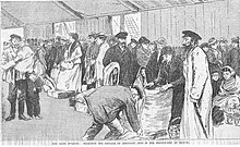 Immigrant Jews in the transit shed at Tilbury (c. 1891). This illustration is captioned "The Alien Invasion". Immigrant Jews in the Transit Shed at Tilbury.jpg