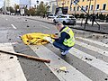 Victime en cours d'identification après une attaque de missiles sur le centre-ville de Kiev, 10 octobre 2022.