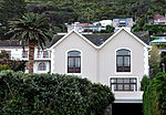 "Sea Fever" is a pleasant seaside cottage on the mountain side of St. James Main Road. The cottage features a double hipped thatched roof with two dormer windows facing the sea. The high stoep is covered with a corrugated iron verandah and enclosed with g Type of site: House Current use: Residential.