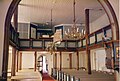 Interieur met orgel en votiefschip