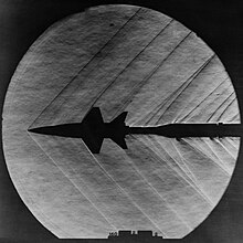 Attached shock wave shown on a X-15 Model in a supersonic wind tunnel X-15 Model in Supersonic Tunnel - GPN-2000-001272.jpg