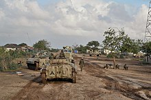 Oegandese troepen van de Afrikaanse Unie tijdens de bevrijding van Kurtunwaarey, 31 aug. 2014.