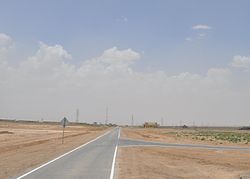 Road leading to a small base of the Afghan armed forces at Islam Qala