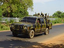 Tamil rebels in a truck in Killinochchi in 2004 LTTE car with soldiers in Killinochi april 2004.jpg