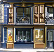 Détail de la façade, côté rue des Grands-Augustins.