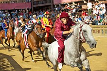 Palio di Siena attracts tourists from every continent. The first edition took place in 1633. Palio di Siena - Assunta 2011 - Torre 2.jpg