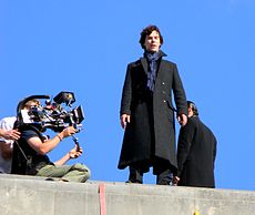 Filming an episode of BBC One's Sherlock (with Benedict Cumberbatch as Sherlock Holmes pictured) in July 2011 The Reichenbach Fall filming (3).JPG