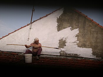 English: Wall painting house painter Español: ...