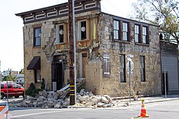 2014 South Napa quake - Stones Fallen From Face of Sam Kee - 1 (15014707736).jpg