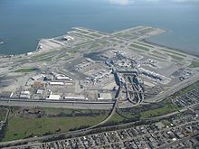 Bird's-eye view of the airport. A spaghetti junction connects the passenger terminal roads to US Route 101. Aerial view of San Francisco International Airport 2010.jpg