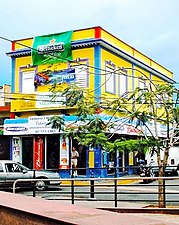 Bright yellow bar in Campo Alegre, Santurce